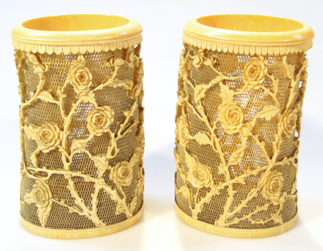 Appraisal: A pair of Chinese Qing period ivory sleeve vases each