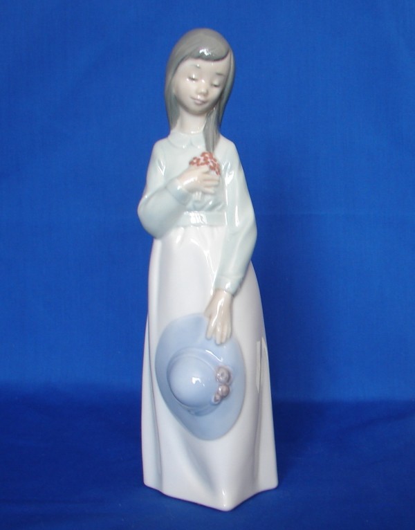 Appraisal: Nao by Lladro - Girl with Flowers Good Condition