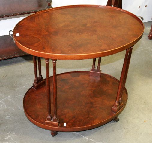 Appraisal: A Georgian style walnut oval two tier traymobile cm long