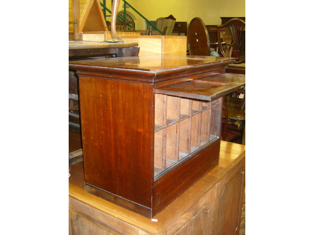 Appraisal: A th century mahogany counter top cabinet enclosed by a