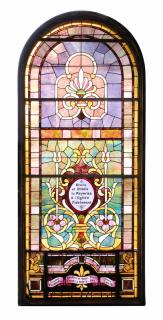 Appraisal: Monumental framed stained glass window th century having an arched