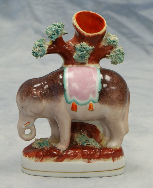 Appraisal: Staffordshire figural spill vase Brown Elephant spider in base tall