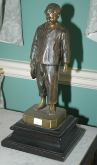 Appraisal: A BRONZE FIGURE OF A YOUNG BOY cm high