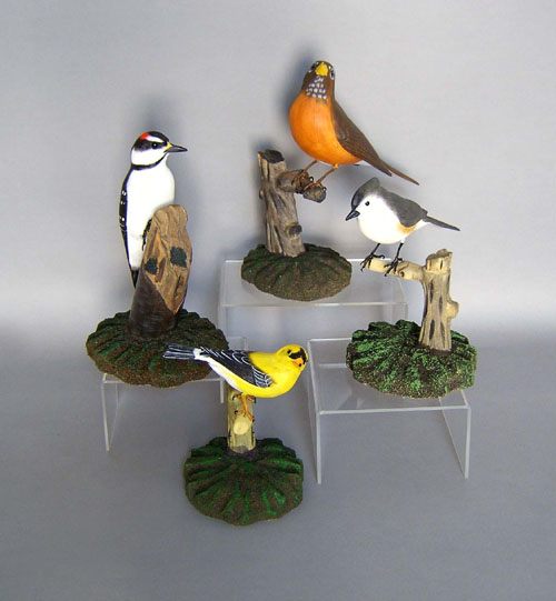 Appraisal: Four carved and painted Wild Backyard Birds tallest - h