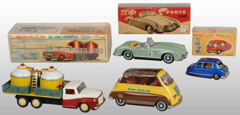 Appraisal: Lot of Tin Litho Vehicle Friction Toys Description Japanese Working