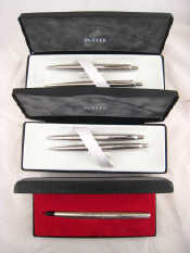 Appraisal: Two Parker ballpoint and pencil sets and a Parker cartridge