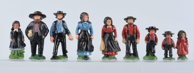 Appraisal: Cast Iron Assorted Amish Figure Novelties Includes two pairs Amish