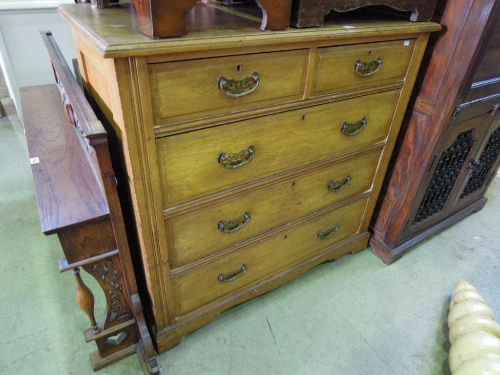 Appraisal: An Edwardian ash wood chest fitted with three long and