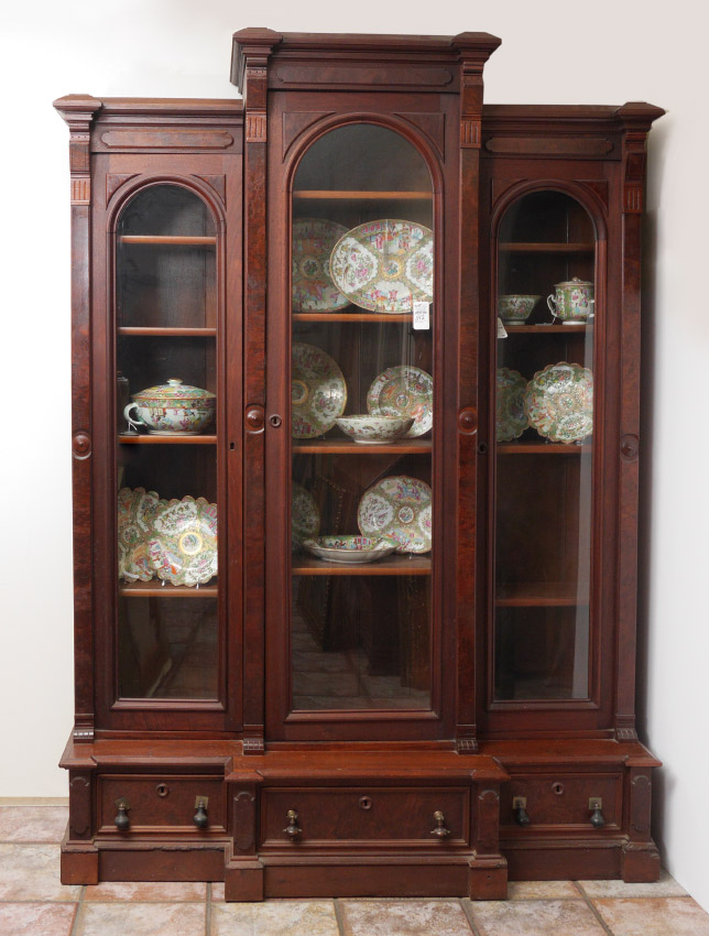 Appraisal: TRIPLE FRONT VICTORIAN BOOKCASE CABINET Bookcase in sections pediments with