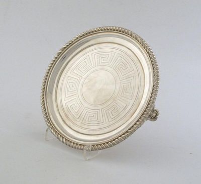 Appraisal: A William IV provincial gadrooned circular waiter with engraved Greek-key