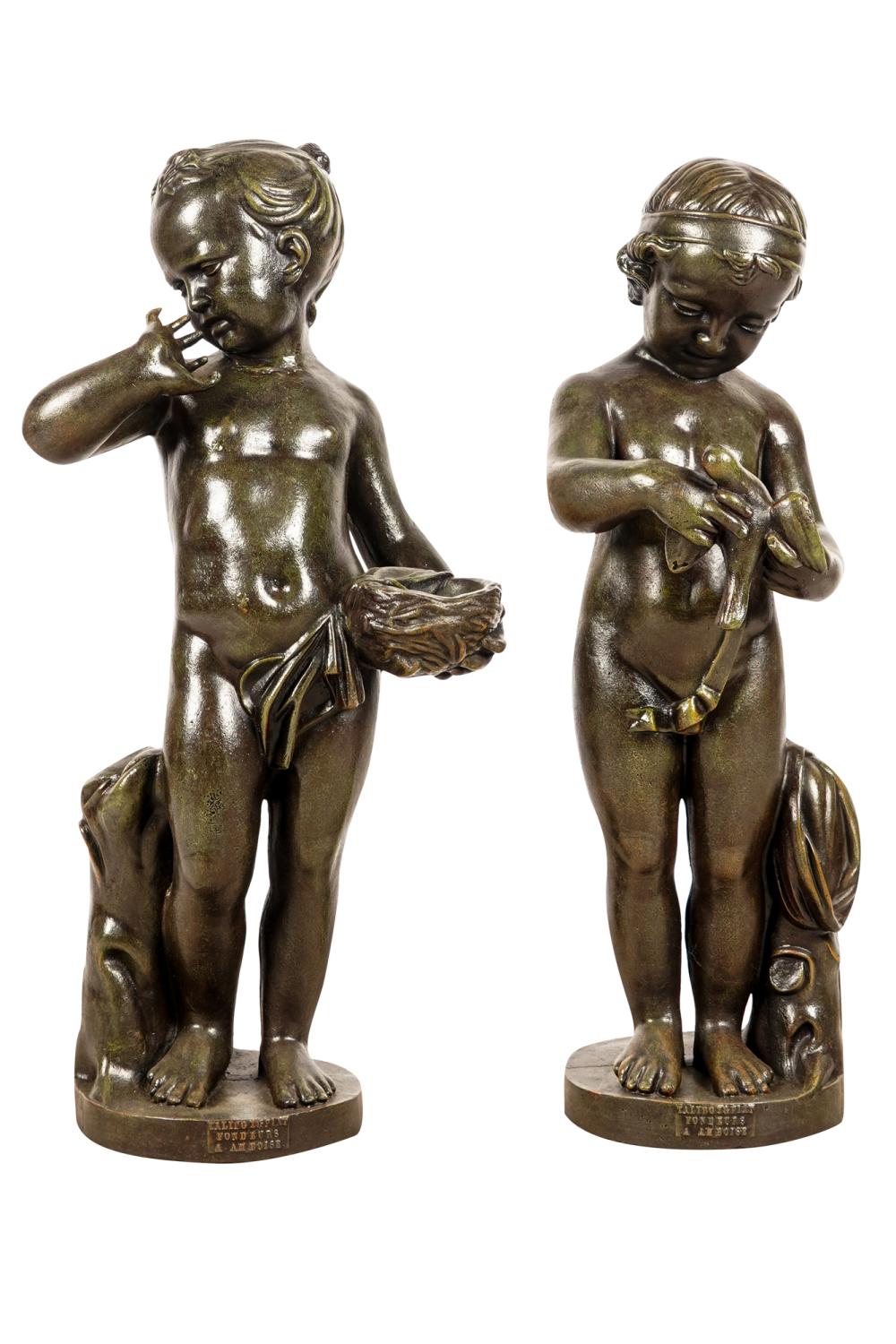 Appraisal: PAIR OF FRENCH CAST IRON FIGURESeach signed in casting Talibot