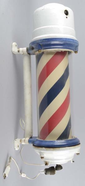 Appraisal: Barber Shop Light-Up Spinning Wall Mount Pole This electric barber