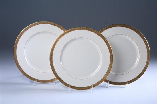 Appraisal: TWELVE LENOX BONE CHINA SERVICE PLATES Ivory gilt encrusted banded