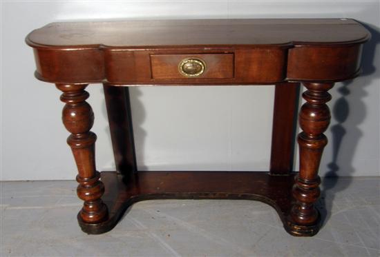 Appraisal: Victorian mahogany break front side table with small under tier