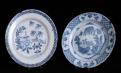 Appraisal: TWO ENGLISH DELFT BLUE AND WHITE CHARGERS Each with garden