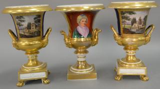 Appraisal: Three French porcelain urns ht in Three French porcelain urns