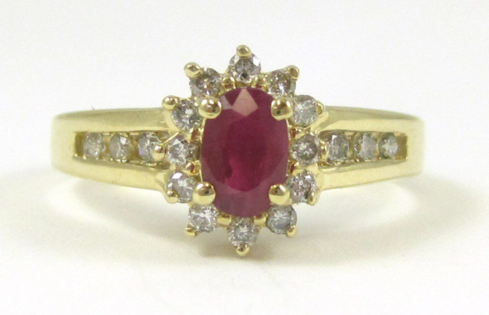 Appraisal: RUBY DIAMOND AND TEN KARAT GOLD RING with round-cut diamonds