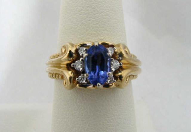 Appraisal: k yellow gold oval tanzanite diamond ring SRP- -