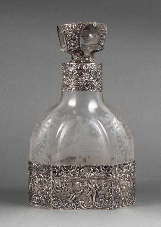 Appraisal: German Rococo style silver mounted etched glass decanter probably Hanau