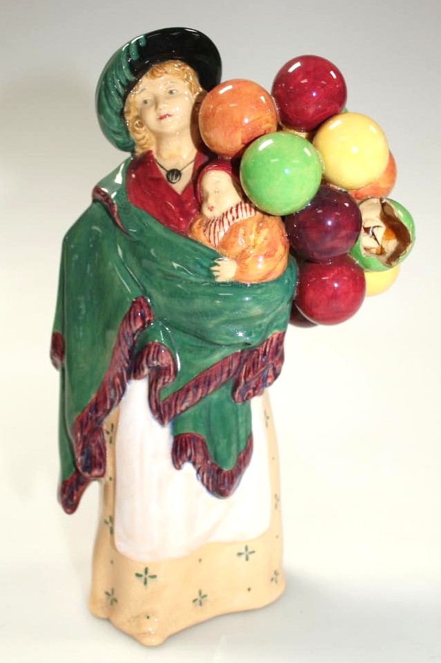 Appraisal: A Royal Doulton figure The Balloon Seller HN printed green