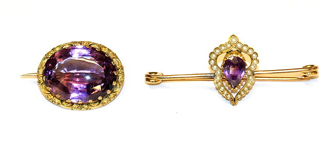 Appraisal: AN AMETHYST AND PEARL BROOCH pear shaped faceted amethyst set