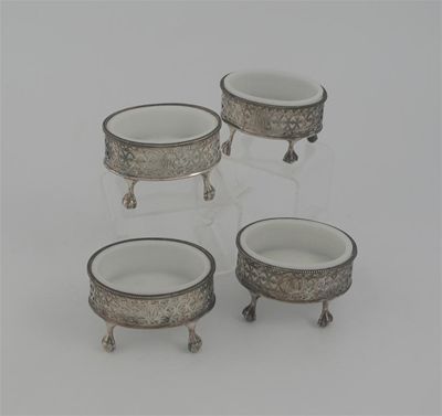 Appraisal: Two similar pairs of George III pierced oval salts on