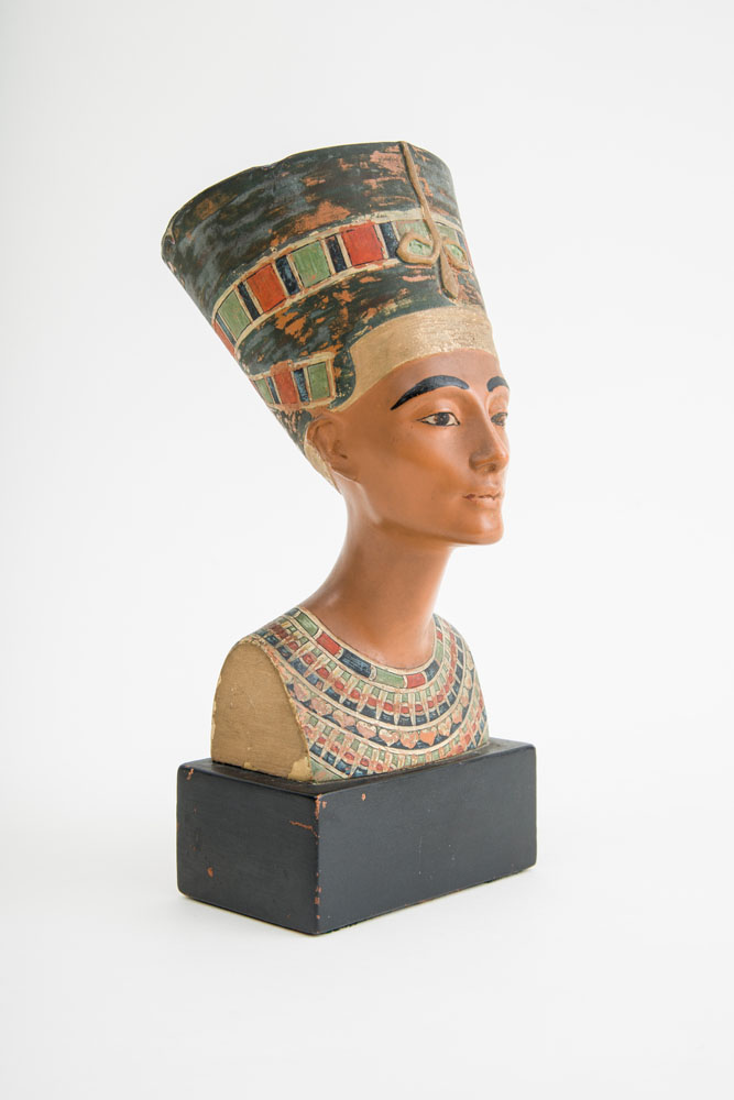 Appraisal: POLYCHROME TERRACOTTA BUST OF NEFERTITI After the original in the