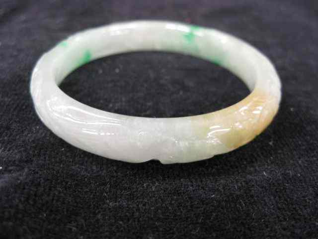 Appraisal: Carved Jade Bangle Bracelet mottledgreen and white mm wide -