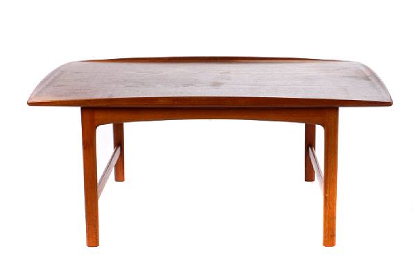 Appraisal: A Swedish teak coffee table Mid th Century branded DUX