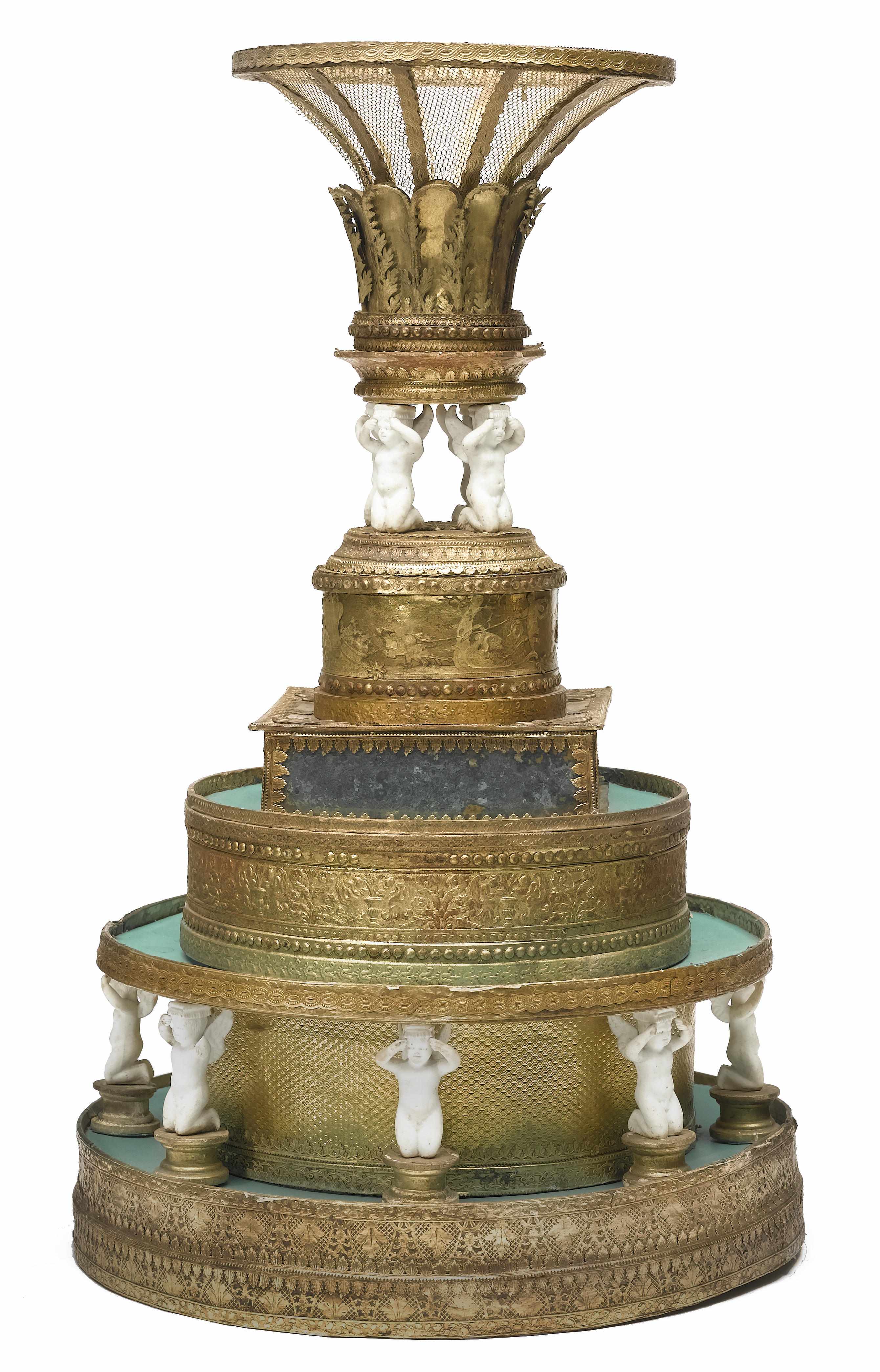 Appraisal: A Continental bisque porcelain and gilt pressed paper centerpiece late