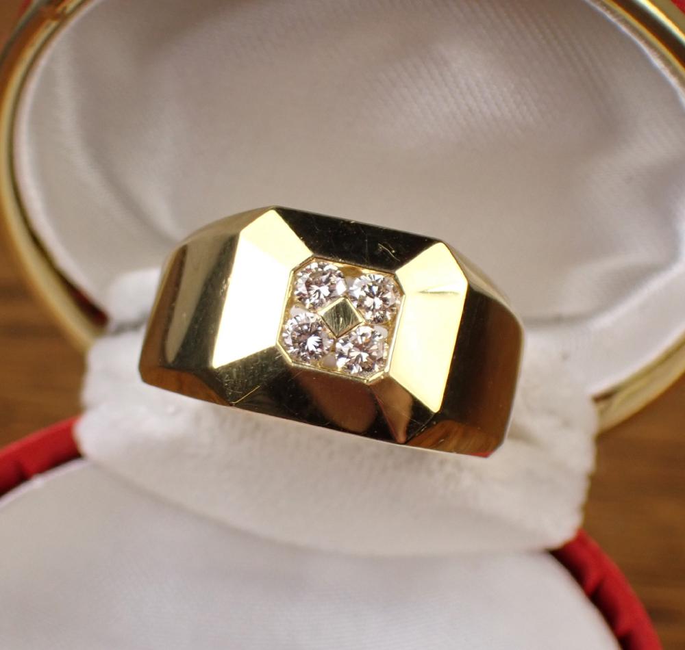 Appraisal: MAN'S DIAMOND AND FOURTEEN KARAT GOLD RING set with four