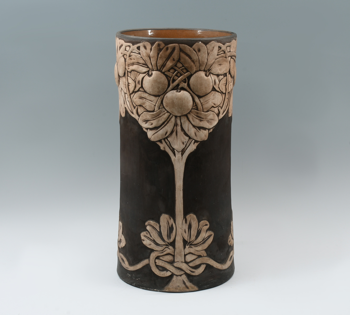 Appraisal: WELLER POTTERY UMBRELLA STAND Having a raised Apple Foliate motif