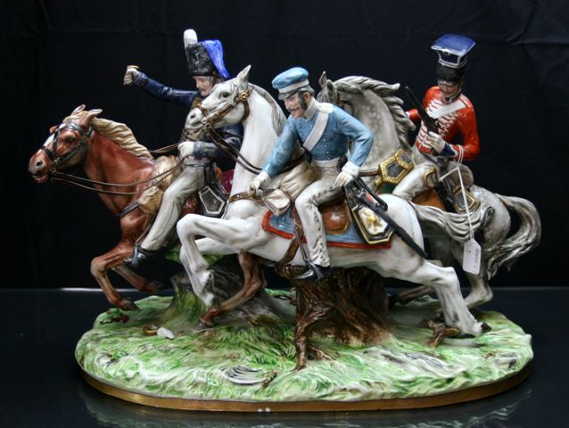 Appraisal: A late th century German porcelain group of soldiers on