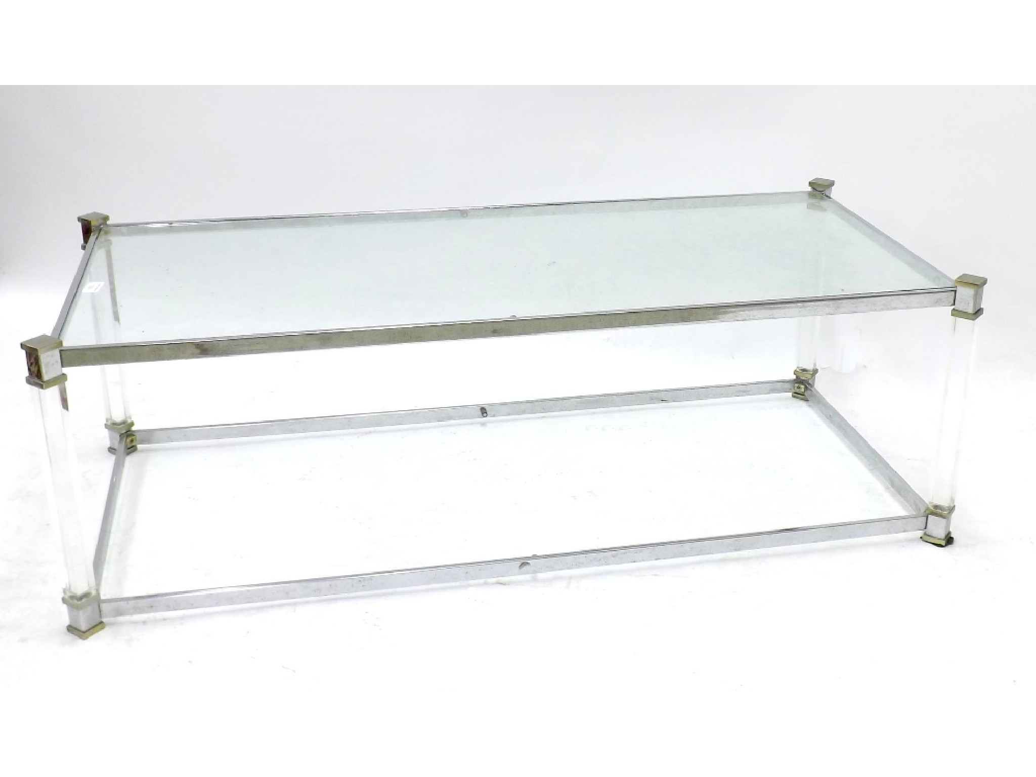 Appraisal: Italian chrome and Perspex two tier coffee table in the