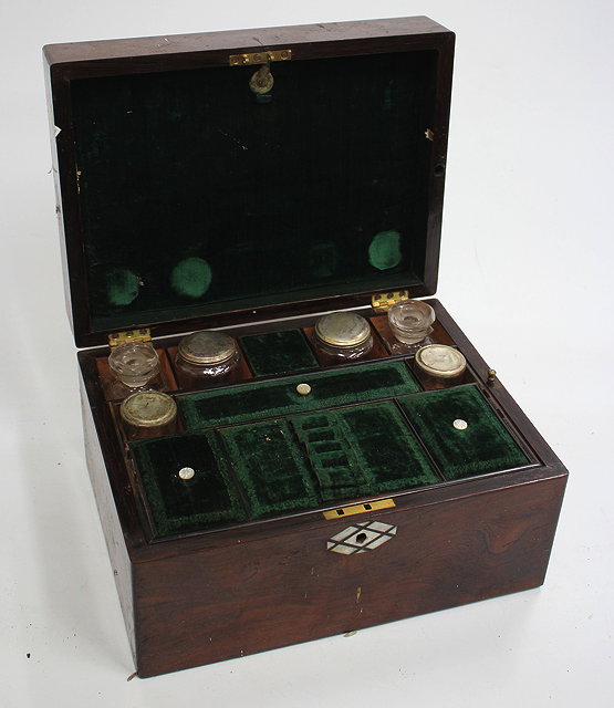 Appraisal: A VICTORIAN ROSEWOOD LADIES DRESSING BOX the fitted interior with