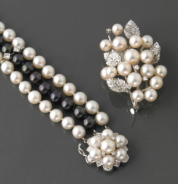 Appraisal: A cultured pearl diamond and white gold brooch with a