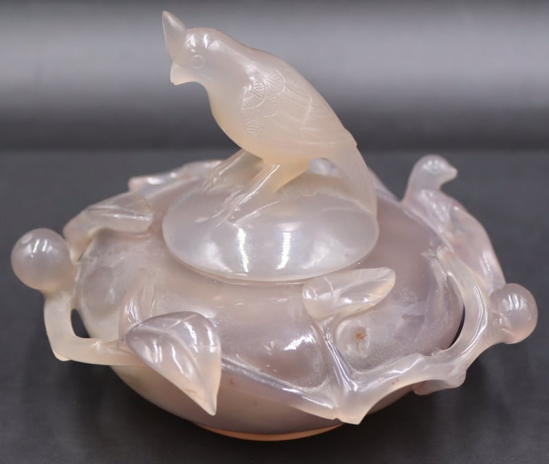 Appraisal: CHINESE CARVED AGATE LIDDED VESSEL WITH BIRD Chinese carved agate