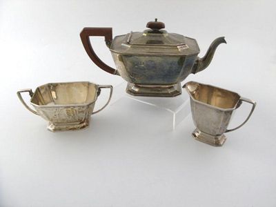 Appraisal: A three-piece silver Art Deco tea set tapering rectangular form