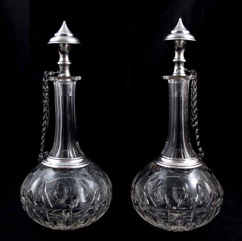 Appraisal: PAIR OF MID EASTERN SILVER MOUNTED BOTTLES Middle Eastern hallmarked