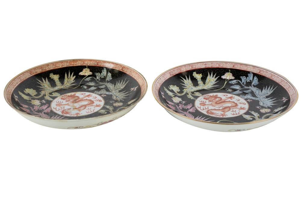 Appraisal: PAIR OF CHINESE FAMILLE NOIRE DRAGON DISHESCondition one dish with