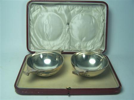 Appraisal: A pair of cased quaichs D G Edwards Glasgow of