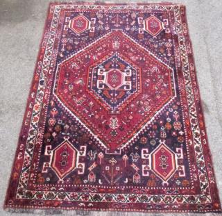 Appraisal: Persian blue ground rug the centre with a lozenge shaped