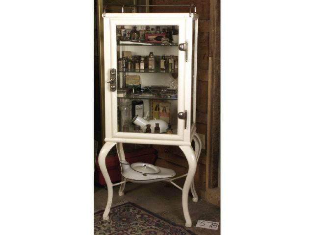 Appraisal: Early metal and glass dentist or doctors cabinet on steel