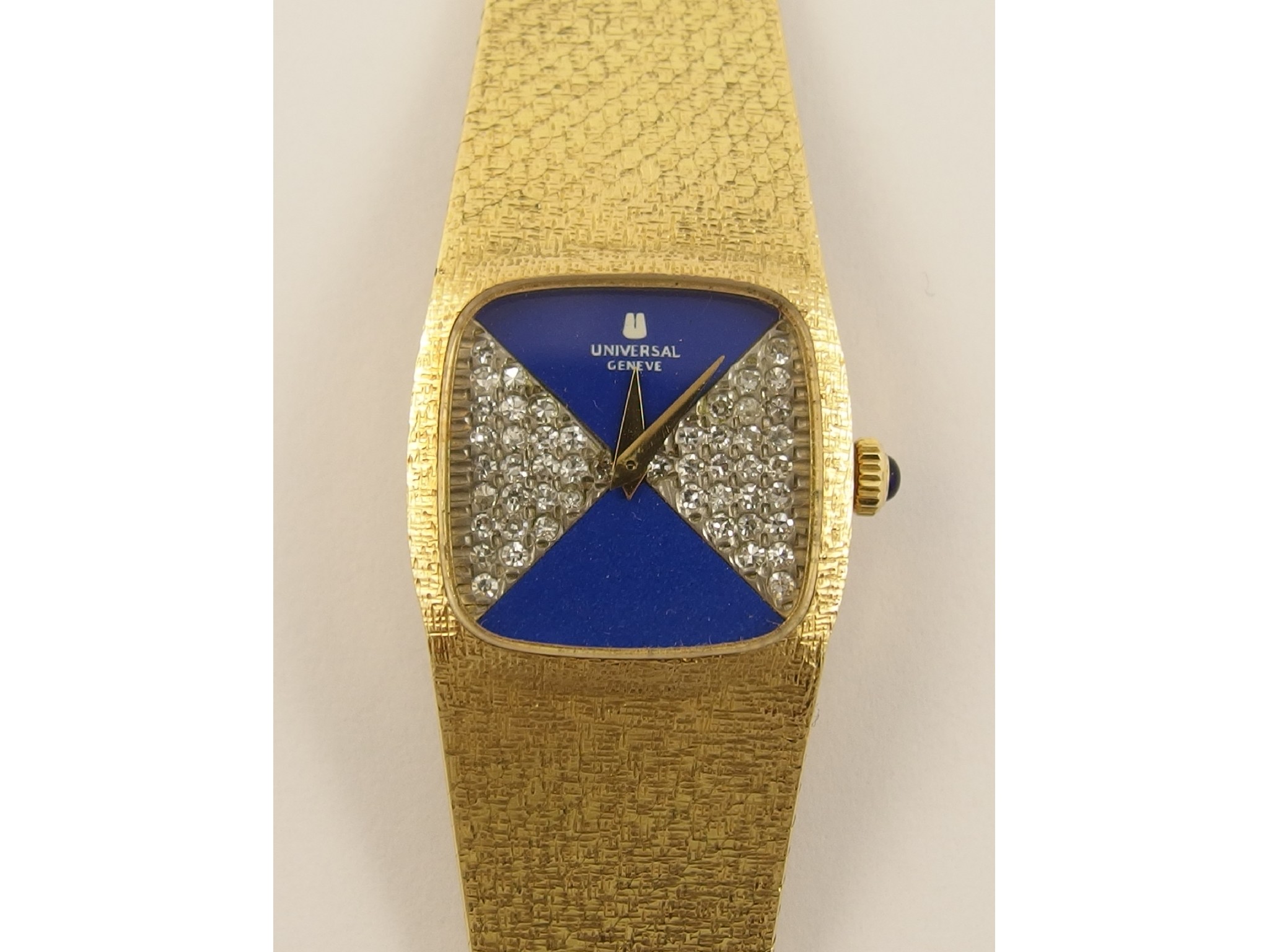 Appraisal: An ct Universal Geneve diamond set watch the square face