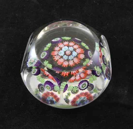 Appraisal: A Baccarat facetted cane rod glass paperweight second half th