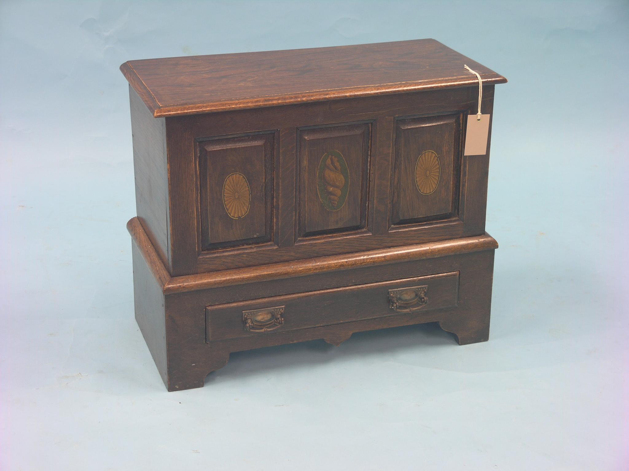 Appraisal: A miniature early Victorian oak dowry coffer detachable cover above