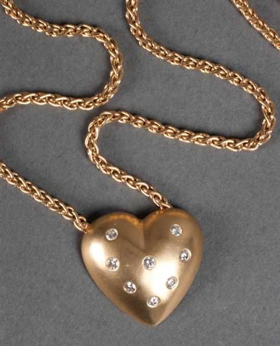 Appraisal: K gold and diamond heart-form pendant necklace diamonds approximately cts