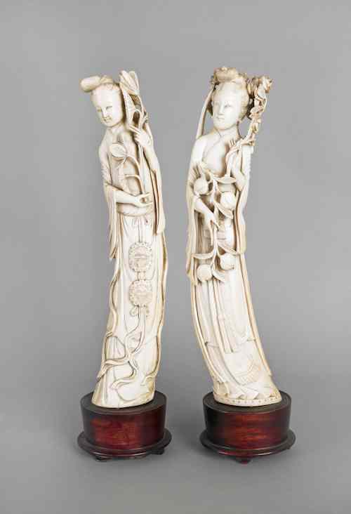 Appraisal: Two Chinese carved ivory Guanyin figures late th c h