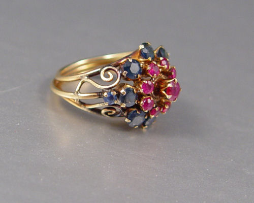 Appraisal: K RUBY SAPPHIRE COCKTAIL RING K yellow gold ring contains