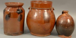 Appraisal: Three piece lot to include two redware crocks with manganese